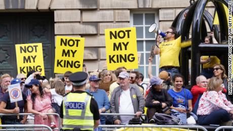 Anti-monarchy protesters gather near St Giles&#39; Cathedral ahead of a National Service of Thanksgiving and Dedication, in Edinburgh on July 5, 2023. Scotland on Wednesday will mark the Coronation of King Charles III and Queen Camilla during a National Service of Thanksgiving and Dedication where the The King will be presented with the Honours of Scotland. (Photo by Danny Lawson / POOL / AFP) (Photo by DANNY LAWSON/POOL/AFP via Getty Images)