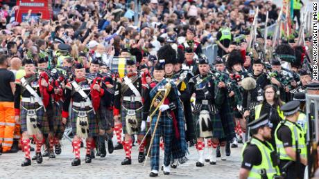 The Combined Cadet Force Pipes and Drums and the Cadet Military Band proceed down Edinburgh&#39;s Royal Mile on July 5, 2023.