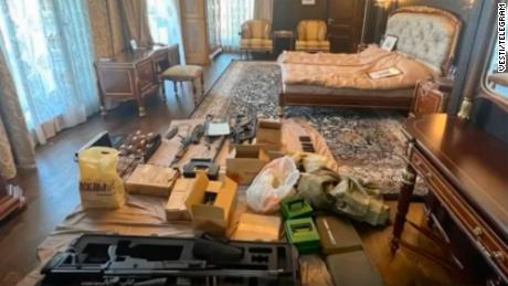 Weapons and ammunition reportedly found during the raid.