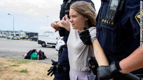 Greta Thunberg charged with disobeying police orders during a protest in Sweden