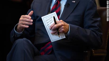 Biden holds his notes as he speaks with Zakaria.