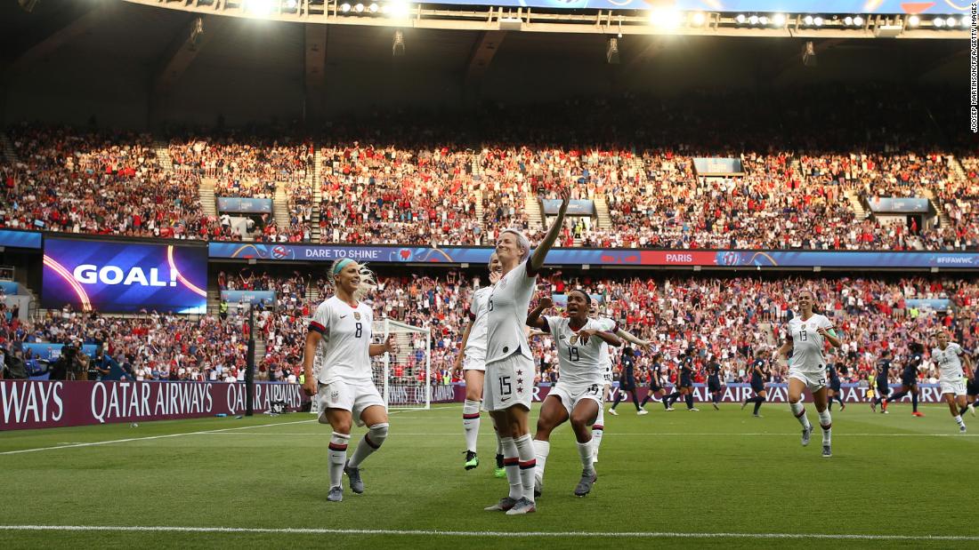 Rapinoe celebrates scoring her team&#39;s first of two goals in their 2019 World Cup quarterfinal win over France in Paris.