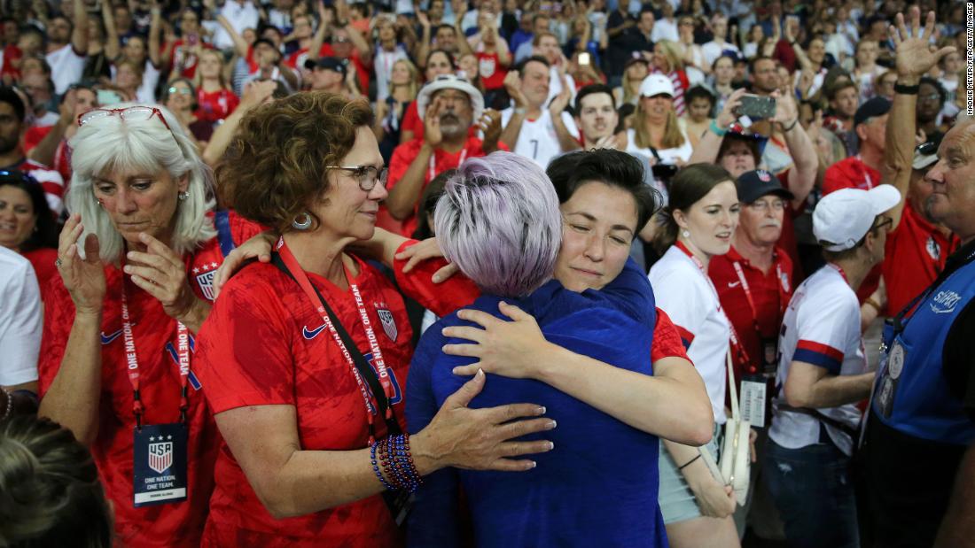 Rapinoe celebrates with her family after defeating France at the 2019 World Cup.