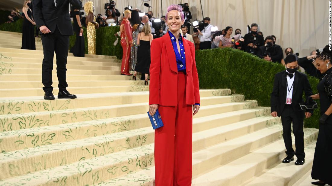 Rapinoe attends the Met Gala in September 2021. She was carrying a red, white and blue clutch that read &quot;in gay we trust.&quot;&lt;br /&gt;