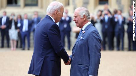 WINDSOR, ENGLAND - JULY 10: The President of the United States, Joe Biden shakes hands with King Charles III in the Quadrangle at Windsor Castle on July 10, 2023 in Windsor, England.