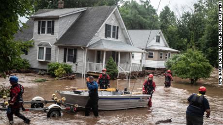 Trapped drivers swam out of their cars. A woman died after being swept away by floodwaters. What to know about the heavy rainfall hitting the Northeast