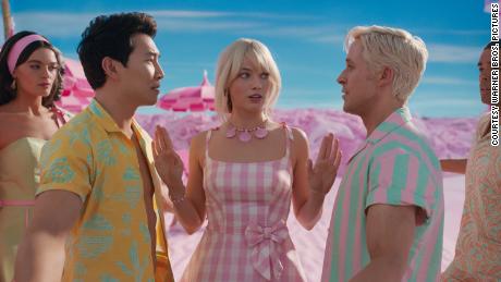 Simu Liu, Margot Robbie and Ryan Gosling in &quot;Barbie.&quot;