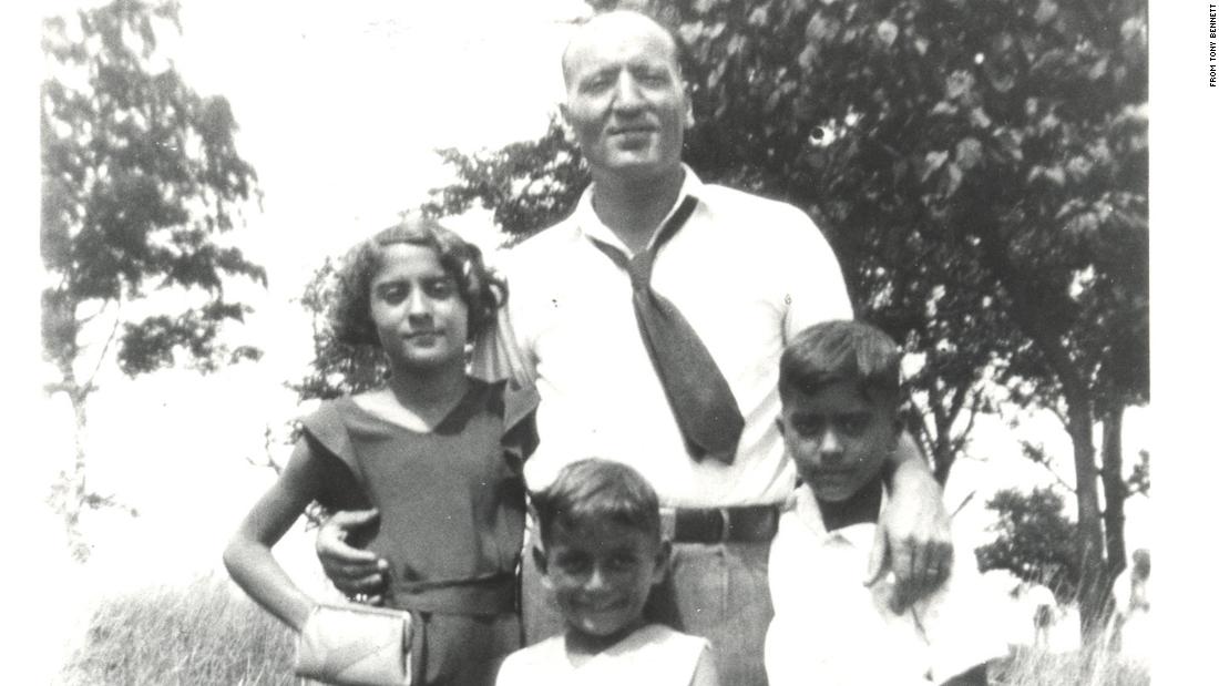 Bennett was born Anthony Dominick Benedetto in 1926. Here, he stands in front of his father, John, and his siblings Mary and John Jr. &lt;a href=&quot;https://www.facebook.com/tonybennett/photos/a.449756719901/10157868837569902/?type=3&quot; target=&quot;_blank&quot;&gt;This photo&lt;/a&gt; was posted to Bennett&#39;s Facebook account for Father&#39;s Day in 2020. He said his dad &quot;inspired my love of both art and music, and I owe much of my success to him.&quot;