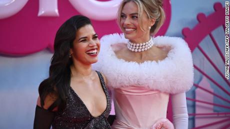US actress America Ferrera (L) and Australian actress Margot Robbie pose on the pink carpet upon arrival for the European premiere of &quot;Barbie&quot; in central London on July 12, 2023. (Photo by JUSTIN TALLIS / AFP) (Photo by JUSTIN TALLIS/AFP via Getty Images)