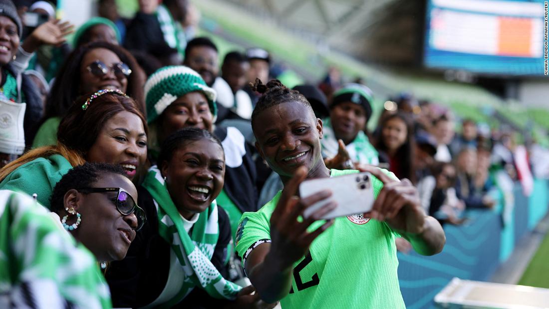 Nigeria&#39;s Uchenna Kanu takes a selfie with fans after the Canada match.