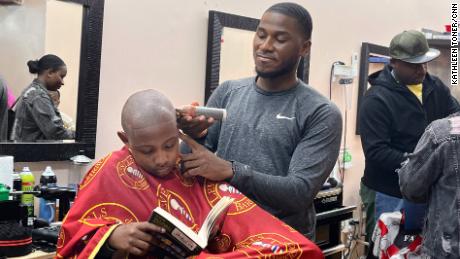 Ryan, who works at Levels Barbershop in New York, has been trained by Irby&#39;s program to engage with students.