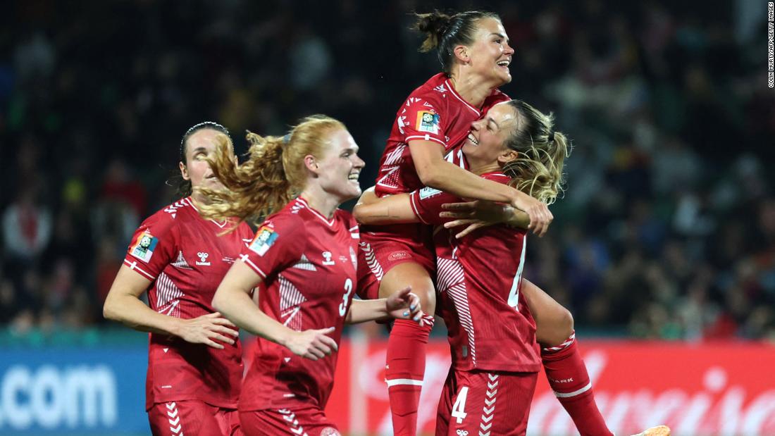 Danish players celebrate Amalie Vangsgaard&#39;s late goal that gave them a 1-0 victory over China on July 22.