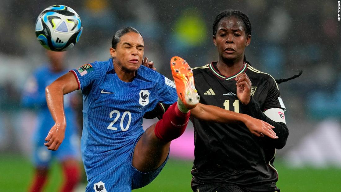 France&#39;s Estelle Cascarino, left, and Shaw battle for the ball.