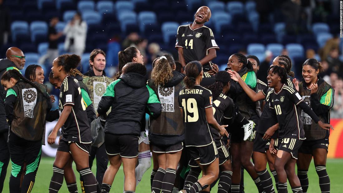Jamaican players celebrate on July 23, after their 0-0 draw against France earned them their country&#39;s first-ever point in the Women&#39;s World Cup.