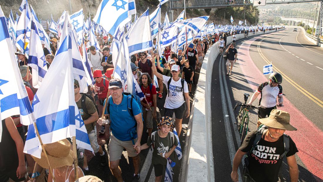 Protesters from Tel Aviv walk the entrance road to Jerusalem after a four-day march on July 22.