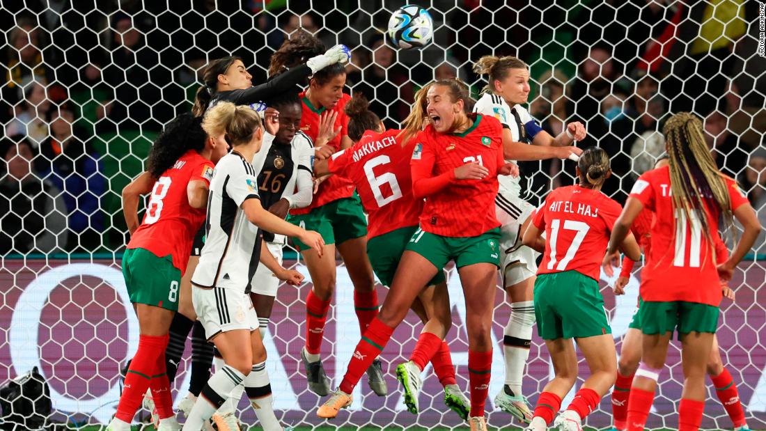 Moroccan goalkeeper Khadija Er-Rmichi tries to punch the ball away during a match against Germany on July 24. &lt;a href=&quot;https://edition.cnn.com/2023/07/23/football/brazil-germany-panama-morocco-womens-world-cup-2023-spt-intl/index.html&quot; target=&quot;_blank&quot;&gt;Germany dominated Morocco 6-0&lt;/a&gt; in what was the biggest scoreline of the tournament so far.