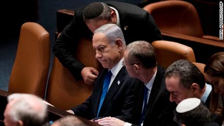 Netanyahu, center, attends a session in the Knesset on Monday, July 24, 2023.
