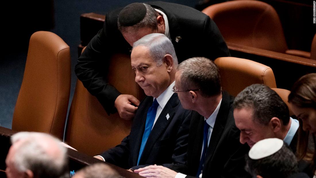Netanyahu is surrounded by lawmakers at a session of the Knesset in July 2023. The Israeli parliament &lt;a href=&quot;https://edition.cnn.com/2023/07/24/middleeast/israel-supreme-court-power-stripped-intl/index.html&quot; target=&quot;_blank&quot;&gt;passed a bill&lt;/a&gt; stripping the Supreme Court of its power to block government decisions, the first part of a planned judicial overhaul that has sparked months of protests across Israel.