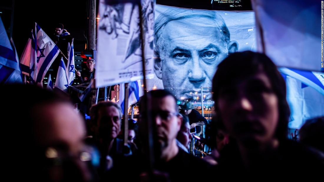 Protesters stand under a photo of Netanyahu during a demonstration in Tel Aviv, Israel, in April 2023. For months, Israelis have been taking to the streets to &lt;a href=&quot;http://www.cnn.com/2023/07/24/middleeast/gallery/israel-judicial-reform-july-protests/index.html&quot; target=&quot;_blank&quot;&gt;protest proposed changes to the country&#39;s legal system&lt;/a&gt;.