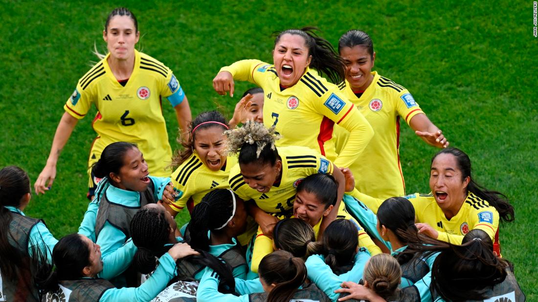 Colombia&#39;s Catalina Usme celebrates with teammates after scoring her team&#39;s first goal against South Korea on July 25. Colombia won 2-0.