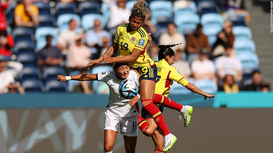South Korea&#39;s Cho So-hyun, bottom left, competes for the ball against Colombia&#39;s Jorelyn Carabali and Carolina Arias.