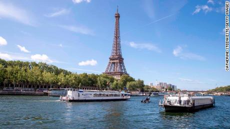 An empty boat travels the River Seine during the technical test event last week for the Paris 2024 opening ceremony.