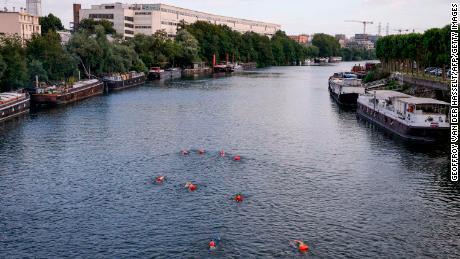 A group of swimmers in the Seine on July 2.
