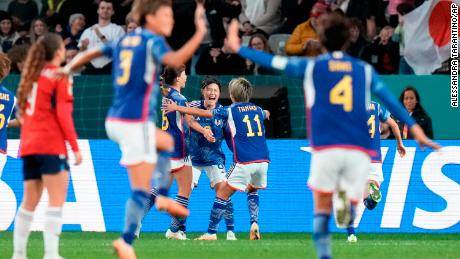 Japan&#39;s Hikaru Naomoto celebrates with her teammates after scoring her team&#39;s first goal against Costa Rica. 