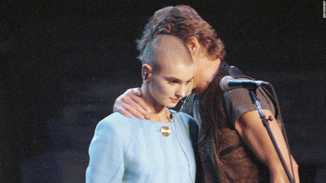 Kris Kristofferson comforts Sinead O&#39;Connor after she was booed during a Bob Dylan anniversary concert in New York in October 1992. This was a couple of weeks after the &quot;SNL&quot; protest.