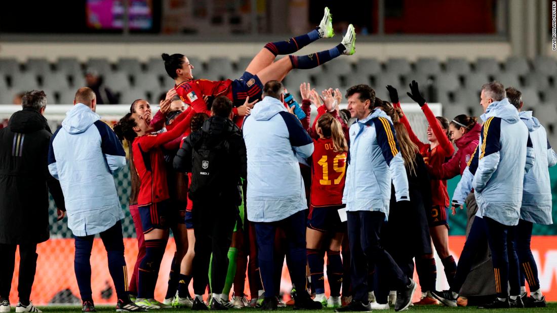 Spain&#39;s Jennifer Hermoso is thrown in the air by teammates as they celebrate their 5-0 victory over Zambia on July 26. With the win, Spain clinched a spot in the tournament&#39;s knockout round.