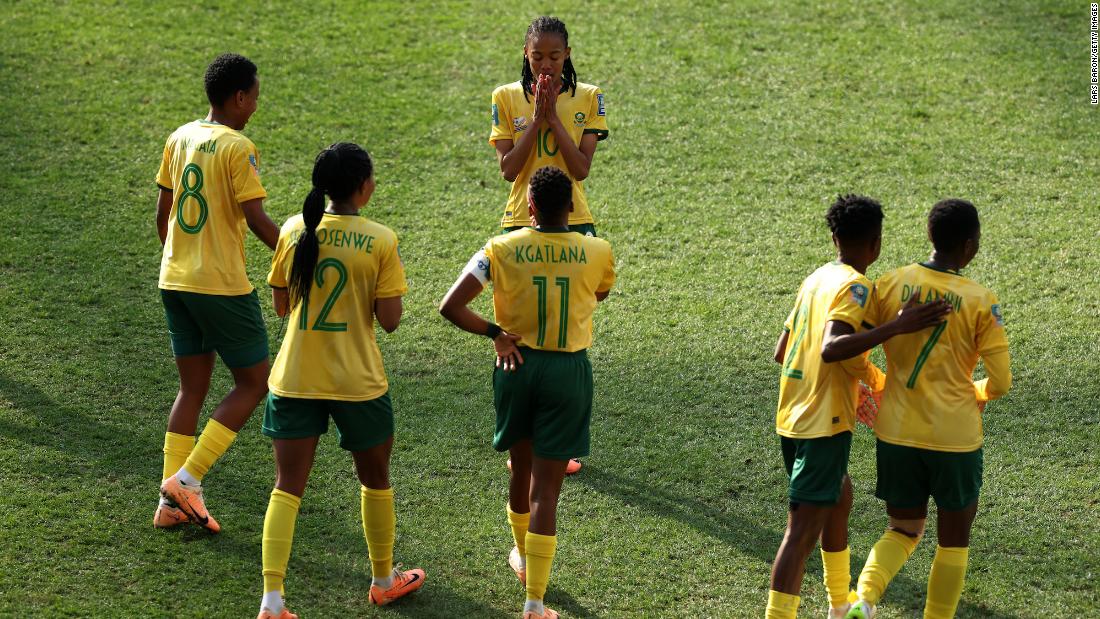 South Africa&#39;s Linda Motlhalo celebrates with teammates after scoring her team&#39;s first goal against Argentina. South Africa led 2-0 before Argentina&#39;s dramatic comeback.