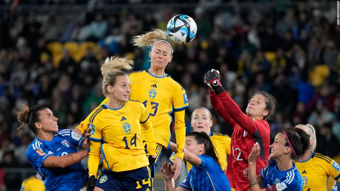 Sweden&#39;s Amanda Ilestedt, center, heads the ball to score the opening goal against Italy on July 29. Sweden won 5-0 to clinch a spot in the round of 16.