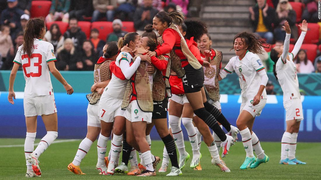 Moroccan players celebrate their 1-0 win over South Korea on July 30.  