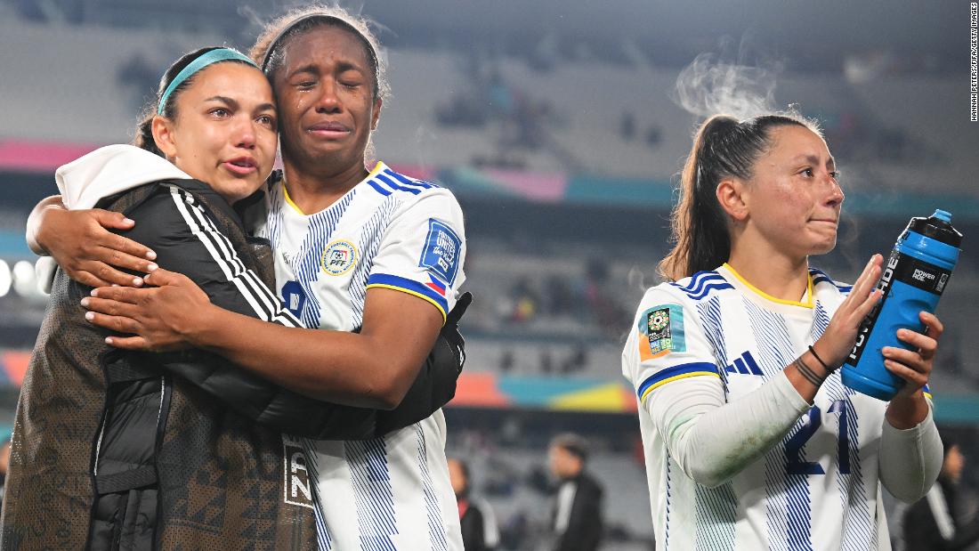 The Philippines&#39; Dominique Randle, center, consoles a teammate after the loss to Norway. The Philippines, playing in its first Women&#39;s World Cup, was eliminated with the loss to Norway.
