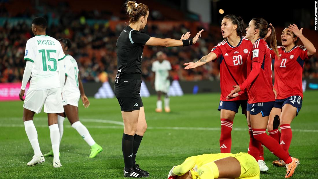 Costa Rican players appeal to referee Bouchra Karboubi before a VAR check on July 31. Zambia beat Costa Rica 3-1. It was Zambia&#39;s first-ever win at a Women&#39;s World Cup.