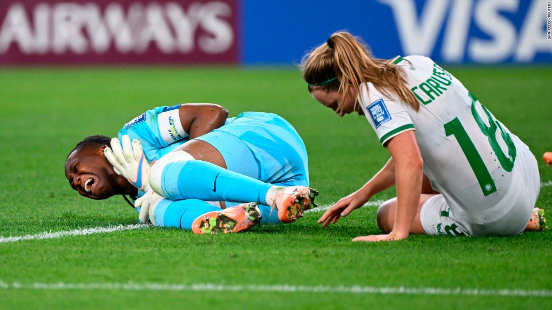 Nigeria&#39;s Chiamaka Nnadozie and Ireland&#39;s Kyra Carusa react after a collision.