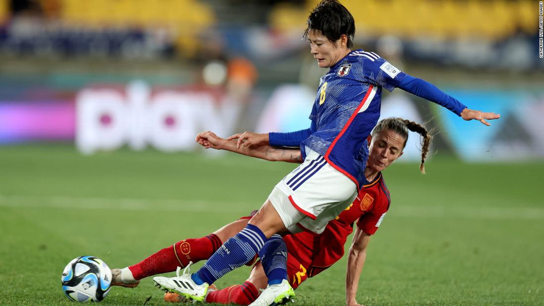 Japan&#39;s Hikaru Naomoto, top, and Spain&#39;s Ona Batlle compete for the ball.