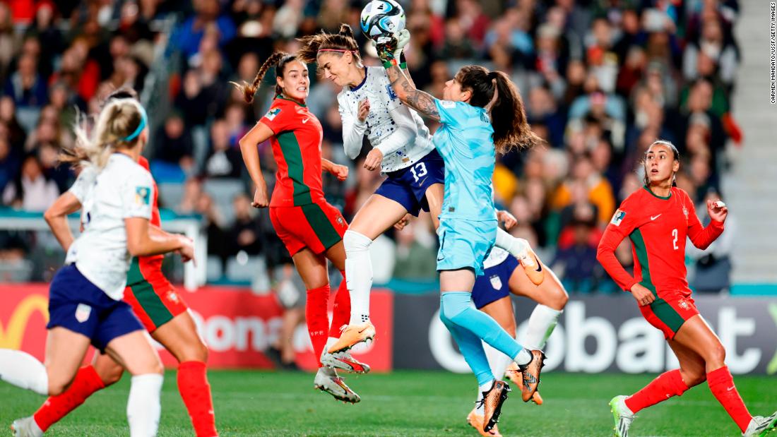 US forward Alex Morgan collides with Portuguese goalkeeper Inês Pereira in the first half.