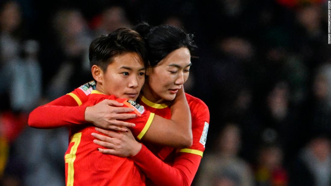 Chinese forward Wang Shuang, left, celebrates with Yang Lina after scoring against England.