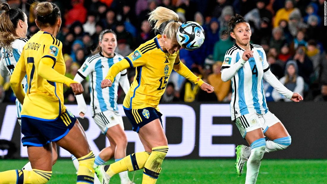 Sweden&#39;s Rebecka Blomqvist heads the ball for a goal against Argentina.