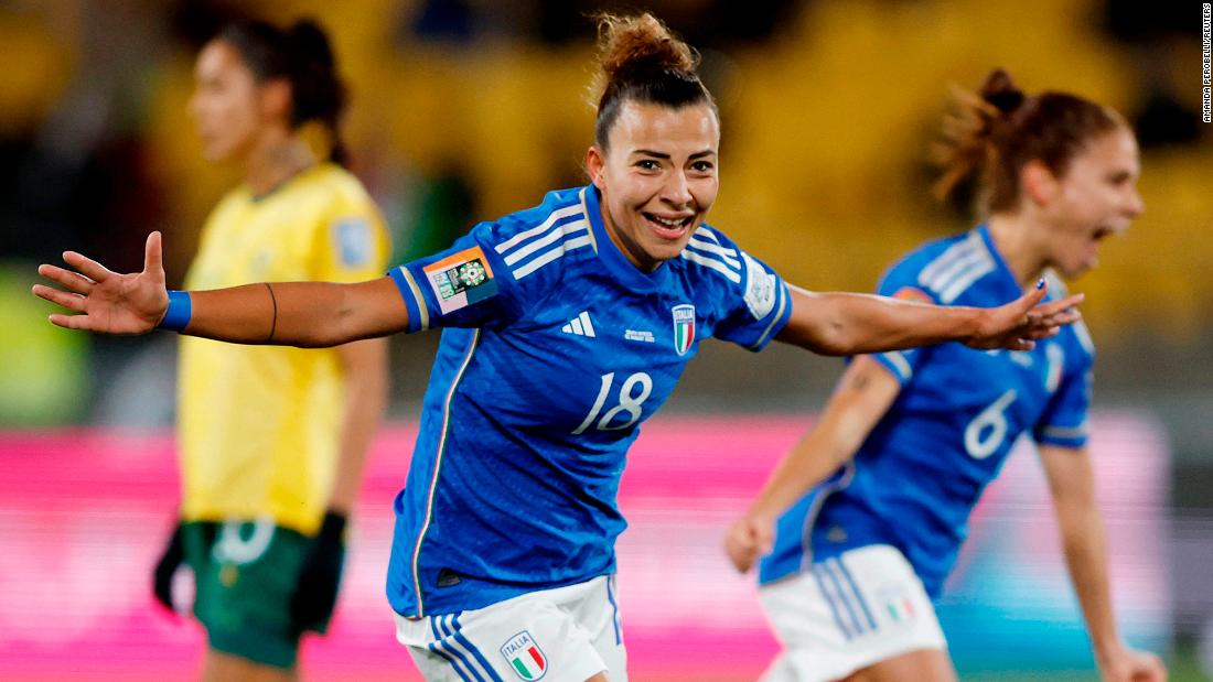Italy&#39;s Arianna Caruso celebrates after scoring against South Africa.