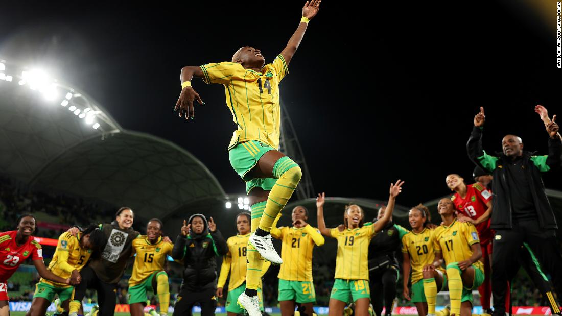 Jamaica&#39;s Deneisha Blackwood celebrates with teammates after the draw with Brazil.
