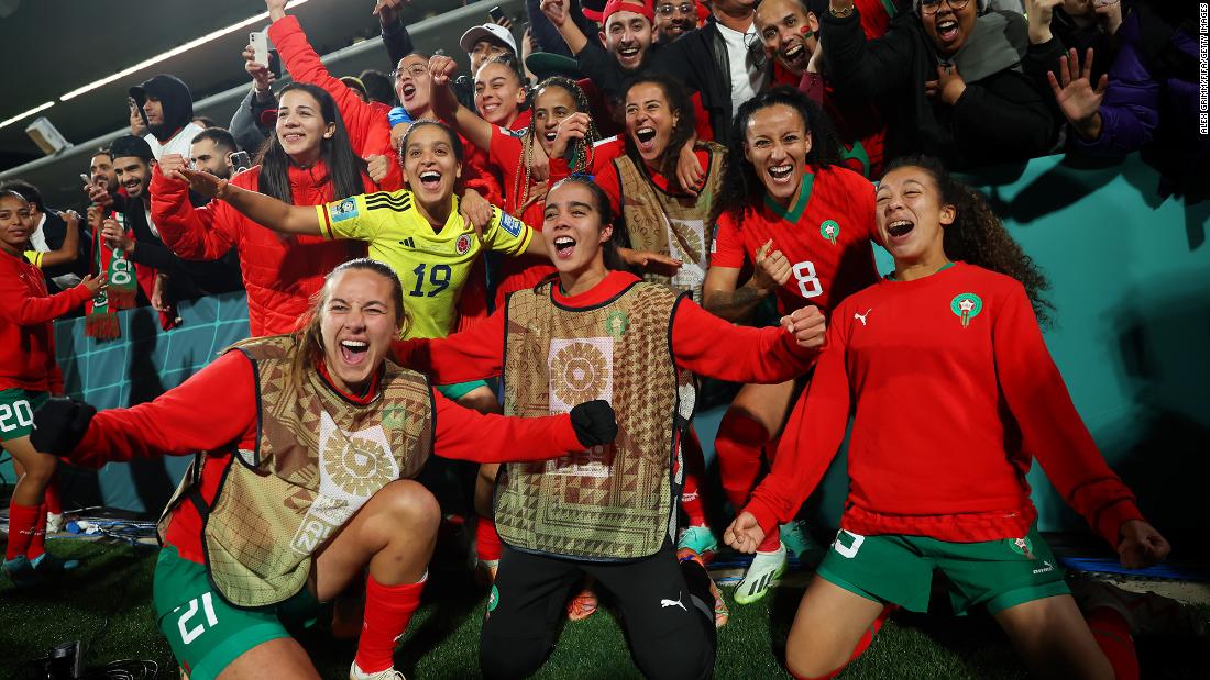 Morocco players celebrate on August 3 after beating Colombia 1-0 to advance to the round of 16.