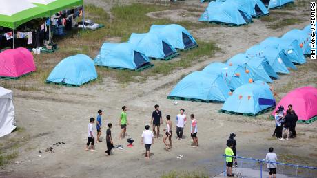 Participants play with a ball at the campsite for the 25th World Scout Jamboree in South Korea, on August 4, 2023.