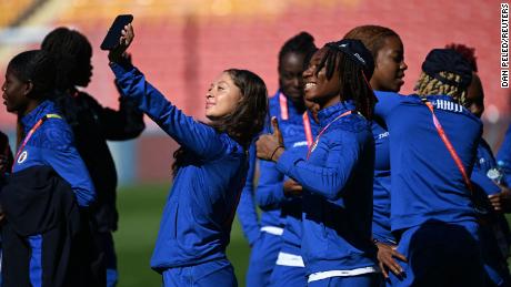 Haiti&#39;s Noa Ganthier holds a phone for a selfie in Brisbane Stadium, Australia, at the Women&#39;s World Cup on July 21, 2023.