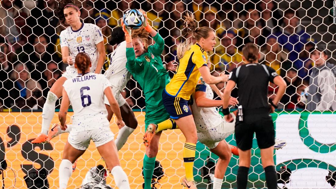 US goalkeeper Alyssa Naeher grabs the ball in front of her goal.