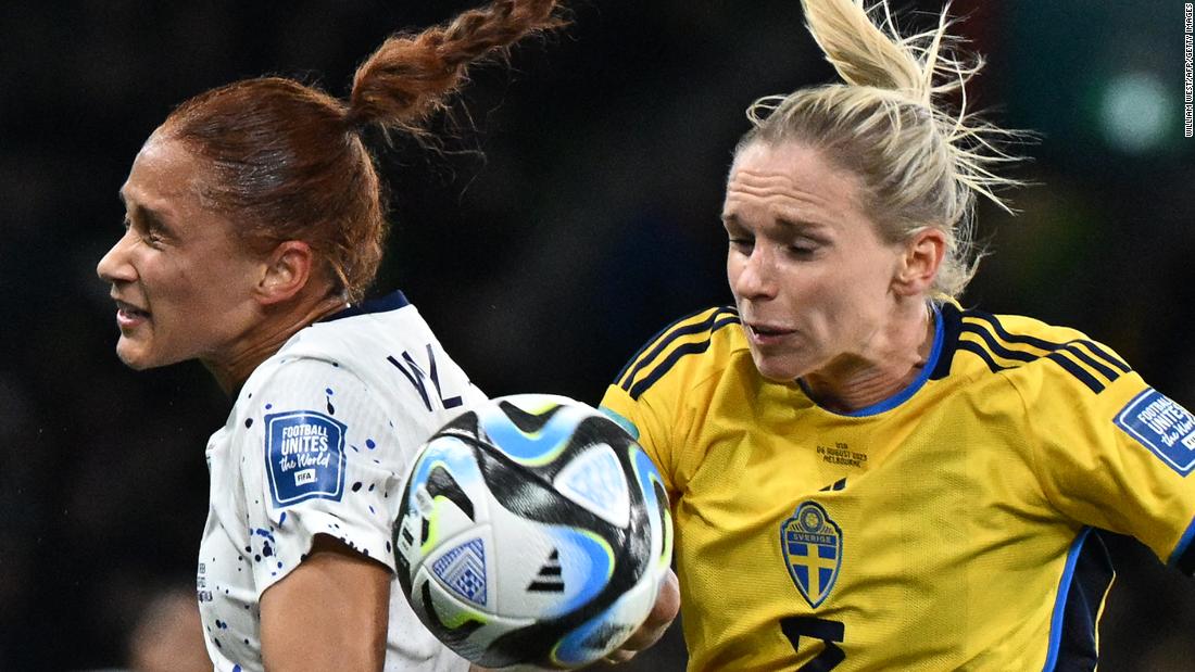 US forward Lynn Williams, left, and Sweden defender Jonna Andersson compete for the ball.