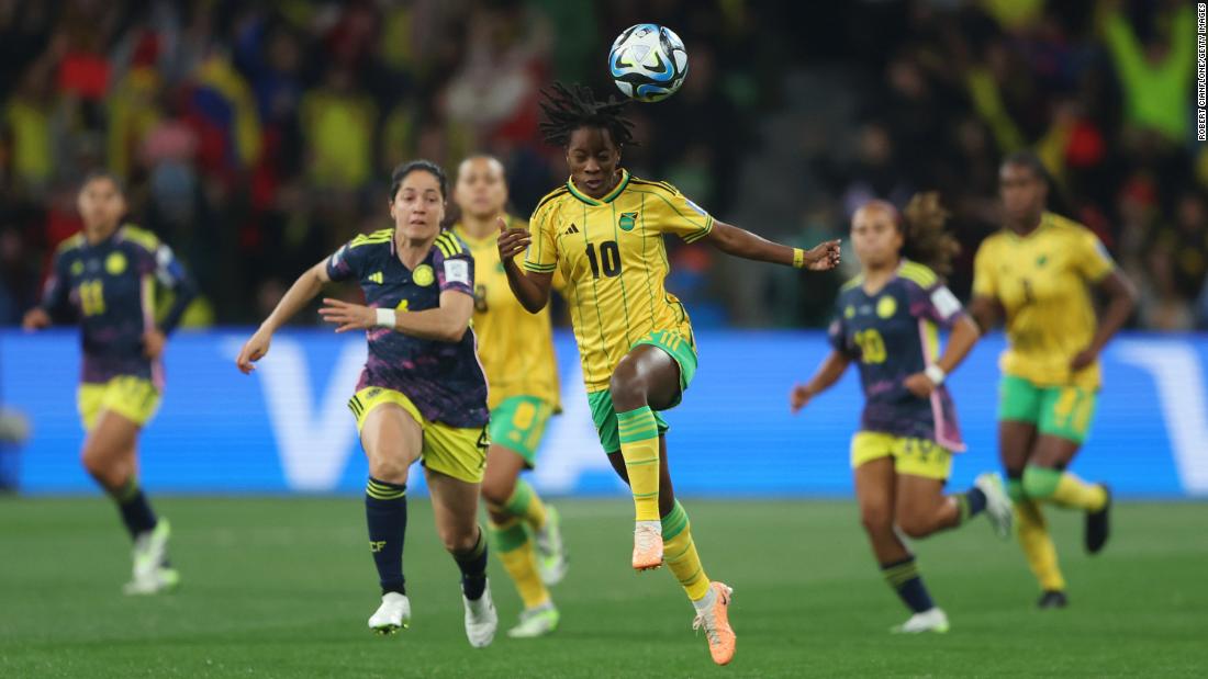 Jamaica&#39;s Jody Brown controls the ball next to Colombia&#39;s Diana Ospina Garcia.