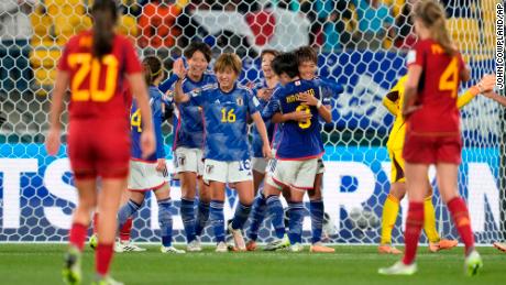 Japan players celebrate at the end of the team&#39;s dominant group stage victory over Spain at the Women&#39;s World Cup.