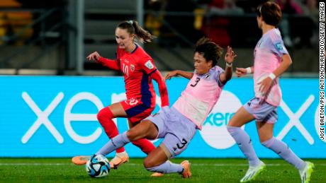 Moeka Minami challenges for the ball against Norway.